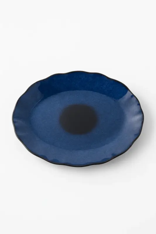 Populaire Japanese ceramic flat plate with irregular shell shape